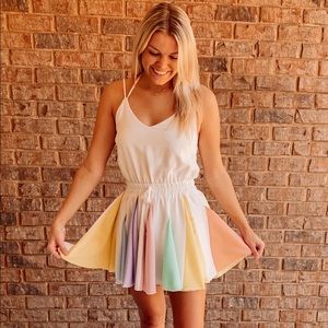 Main strip Romper NEVER WORN!